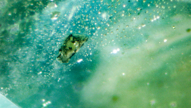 W15-Zwaan-fig17_194379-636x358.jpg. First documented topaz crystal inclusion in sapphire