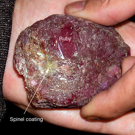 High-quality ruby core underneath spinel coating High-quality ruby core underneath spinel coating