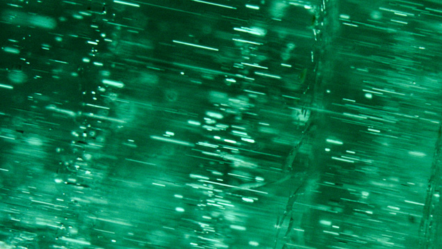 Cloud of fine elongate tubes in a Brazilian emerald Cloud of fine elongate tubes in a Brazilian emerald