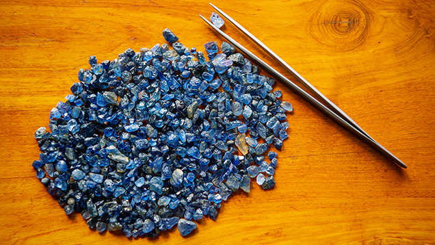 Parcel of sapphire rough examined at a dealer’s office in Mogok Parcel of sapphire rough examined at a dealer’s office in Mogok