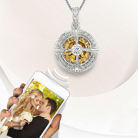 Figure 21. A mobile application is used to transmit data between the NFC chip inside the jewelry and a mobile device. Courtesy of Chi Huynh. Figure 21. A mobile application is used to transmit data between the NFC chip inside the jewelry and a mobile device. Courtesy of Chi Huynh.