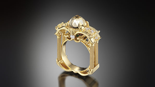 Figure 22. This ring features a 14K gold setting and a white DavinChi Cut topaz. Courtesy of Chi Huynh. Figure 22. This ring features a 14K gold setting and a white DavinChi Cut topaz. Courtesy of Chi Huynh.
