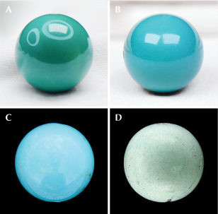 Figure A-2. The appearance of different qualities of natural turquoise. A: Greenish blue “porcelain” turquoise, 14.5 mm diameter, 4.86 g. B: Greenish blue “porcelain” turquoise, 14.5 mm diameter, 4.80 g. C: Medium-quality material, 12.0 mm diameter, 3.80 g. D: Porous material prior to treatment, 10.0 mm diameter, 1.5 g. Photos by Ren Fei, Jin Yu Turquoise Company.