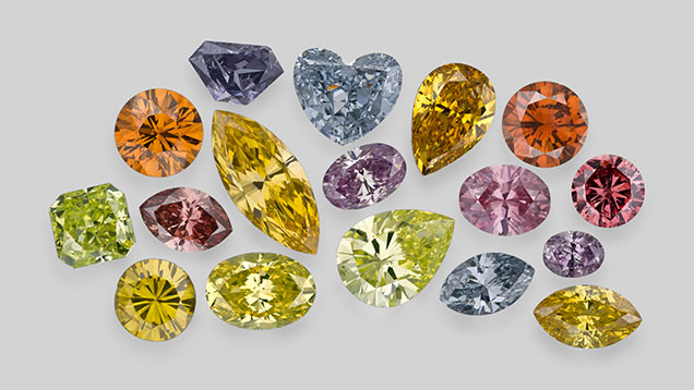 Figure 11. Fancy-color diamonds, such as these examples from the Aurora Butterfly of Peace, owe their spectacular hues to many causes, including tiny amounts of impurities, atomic-level structural defects, or plastic deformation deep in the earth. Photos by Robert and Orasa Weldon. Figure 11. Fancy-color diamonds, such as these examples from the Aurora Butterfly of Peace, owe their spectacular hues to many causes, including tiny amounts of impurities, atomic-level structural defects, or plastic deformation deep in the earth. Photos by Robert and Orasa Weldon.