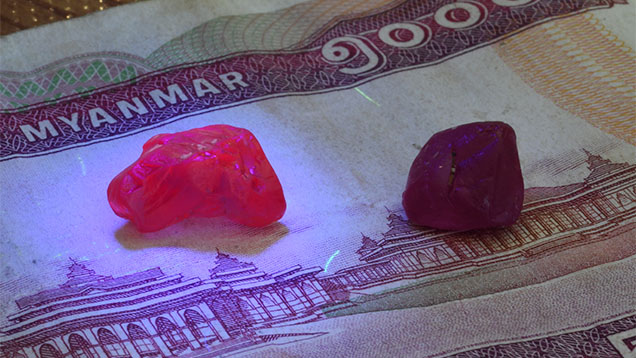 Figure 12. The larger of these two rubies from Namya, Myanmar, weighing 7.5 ct (left) and 4.5 ct (right), is pictured under long-wave fluorescent light. These high-quality gems from Kachin State are often mistaken for Mogok rubies due to their similar quality. Photo by Wim Vertriest. Figure 12. The larger of these two rubies from Namya, Myanmar, weighing 7.5 ct (left) and 4.5 ct (right), is pictured under long-wave fluorescent light. These high-quality gems from Kachin State are often mistaken for Mogok rubies due to their similar quality. Photo by Wim Vertriest.