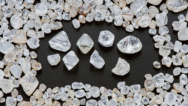 Figure 7. Once rough diamonds such as these from Angola enter the supply chain and are mixed with diamonds from other mines, determining their geographic origin is currently impossible. Photo by Robert Weldon; courtesy of Diamond Trading Antwerpen. Figure 7. Once rough diamonds such as these from Angola enter the supply chain and are mixed with diamonds from other mines, determining their geographic origin is currently impossible. Photo by Robert Weldon; courtesy of Diamond Trading Antwerpen.