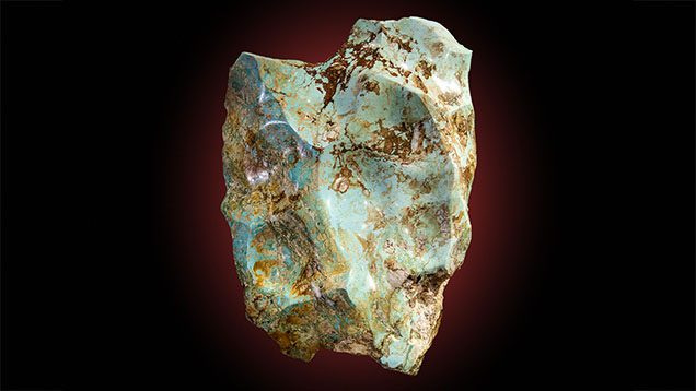 Figure 5. This 111 kg stabilized turquoise nugget, measuring approximately 1 m × 50 cm × 30 cm, was originally recovered from the Mona Lisa mine in the 1980s. Polished in 2018 by Michael Beck (Copper Canyon Lapidary & Jewelry, Sedona, Arizona). Photo by Robert Weldon. Figure 5. This 111 kg stabilized turquoise nugget, measuring approximately 1 m × 50 cm × 30 cm, was originally recovered from the Mona Lisa mine in the 1980s. Polished in 2018 by Michael Beck (Copper Canyon Lapidary & Jewelry, Sedona, Arizona). Photo by Robert Weldon.
