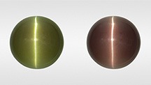 Alexandrite cabochon in fluorescent (left) and incandescent light (right). Alexandrite cabochon in fluorescent (left) and incandescent light (right).