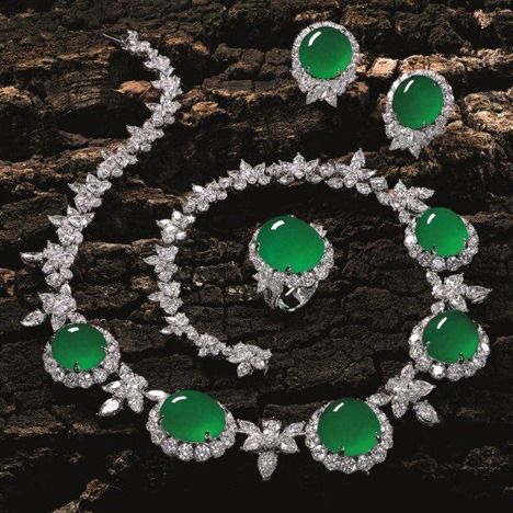 This jade and diamond set of necklace and earrings drew a winning bid of $3.78 million at the Tiancheng International auction in Hong Kong. The eight jade cabochons measured 20.13 mm x 17.13 mm x 9.73 mm and were set with 73.55 carats of diamonds. Courtesy of Tiancheng International.