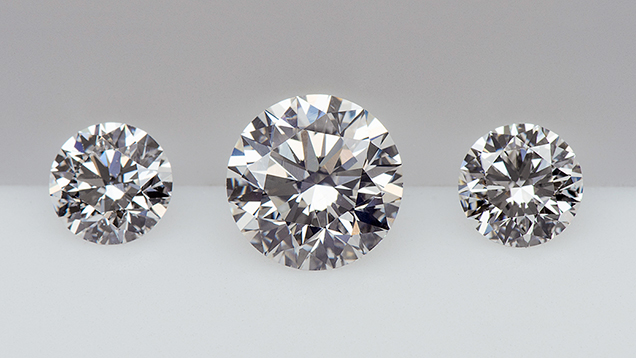No visible difference in color appearance or transparency was noted when flanked by nonfluorescent diamonds of similar color. No visible difference in color appearance or transparency was noted when flanked by nonfluorescent diamonds of similar color.