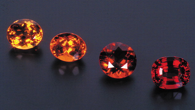 These gems, ranging from orangy yellow to reddish orange, are examples of fine citrine color. - Courtesy C. Y. Sheng