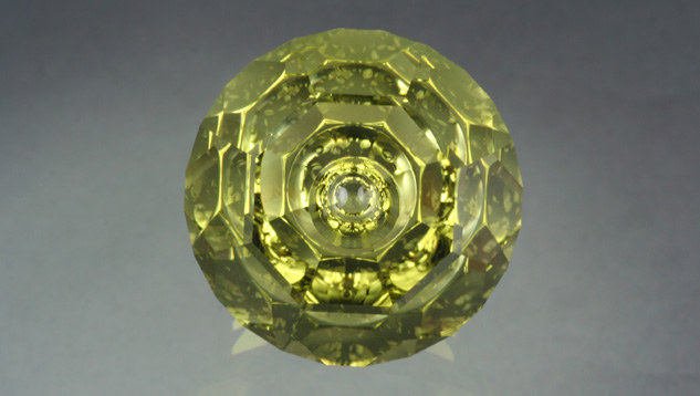 John Dyer’s Lime Citrine Reflections™ is a gem with an attractive lime green color, a fascinating designer cut, and a weight of 33.35 carats. – Lydia Dyer, gem courtesy of John Dyer & Co. John Dyer’s Lime Citrine Reflections™ is a gem with an attractive lime green color, a fascinating designer cut, and a weight of 33.35 carats. – Lydia Dyer, gem courtesy of John Dyer & Co.