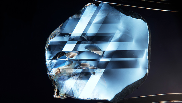 Ethiopian sapphire wafer with twinning. Ethiopian sapphire wafer with twinning.
