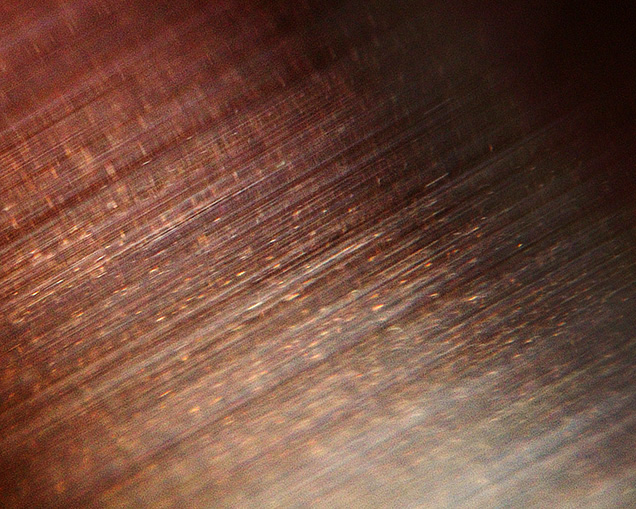 Iridescent needles and particles in alexandrite. Iridescent needles and particles in alexandrite.