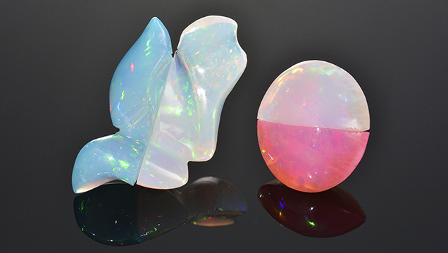 The blue and pink opals were confirmed to be dyed hydrophane opal, likely from Ethiopia. Half of each stone has been bleached using 3% hydrogen peroxide solution. The blue and pink opals were confirmed to be dyed hydrophane opal, likely from Ethiopia. Half of each stone has been bleached using 3% hydrogen peroxide solution.
