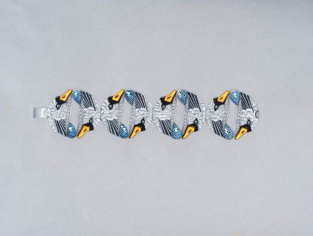 2022 Winner Design by Sara Guergova, a graduate of the GIA Jewelry Design course in London, UK – “Swans represent togetherness and loyalty, and during the time of designing this bracelet, I felt those themes needed to shown the most.”. The bracelet design features gold, diamond, ruby, sapphire, tourmaline, onyx and enamel. 2022 Winner Design by Sara Guergova, a graduate of the GIA Jewelry Design course in London, UK – “Swans represent togetherness and loyalty, and during the time of designing this bracelet, I felt those themes needed to shown the most.”. The bracelet design features gold, diamond, ruby, sapphire, tourmaline, onyx and enamel.