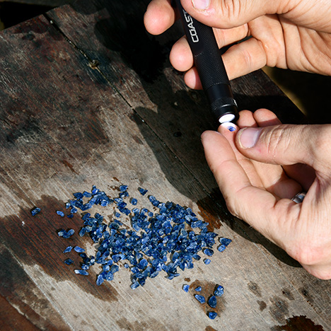 GIA field gemologists inspect blue sapphires in northern Mogok GIA field gemologists inspect blue sapphires in northern Mogok